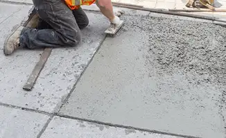 Professional repairing a concrete floor in Savannah, GA